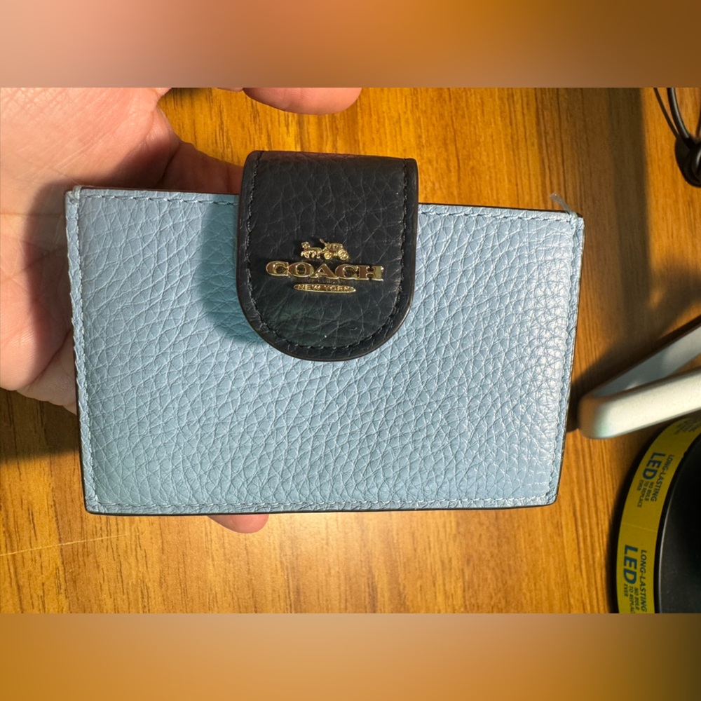 Coach blue card case, in used great condition.